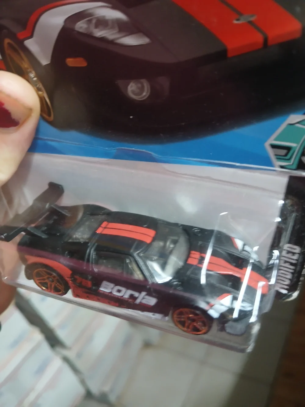 the Hot Wheels Ford GT (159/250) in black with red and white accents